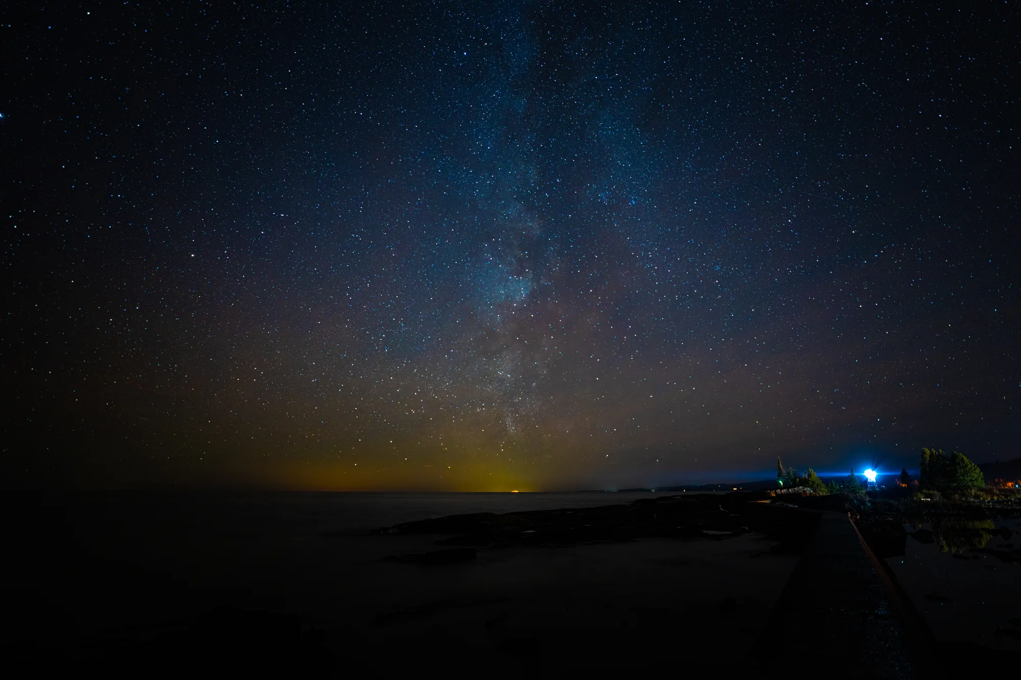 milky way over silver bay on lake superior