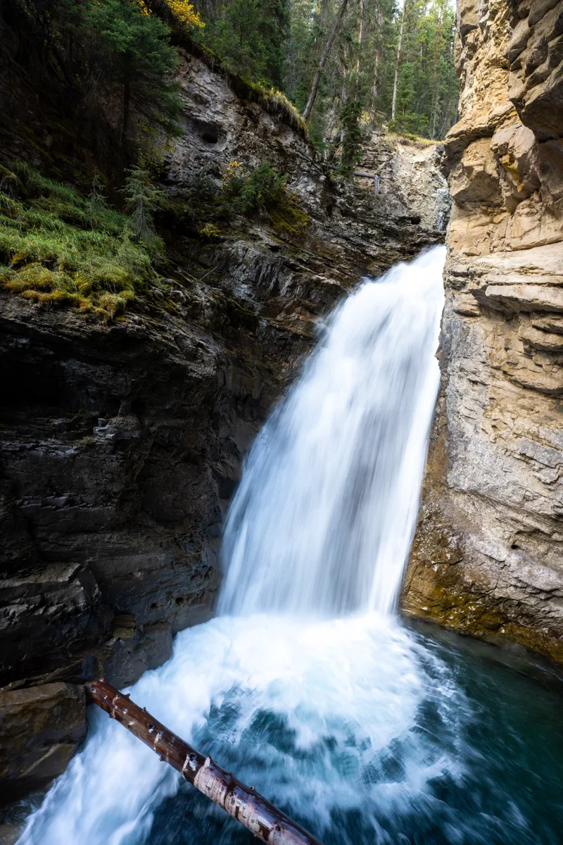long exposure of johnston canyon lower falls from the mid waterfall lookout