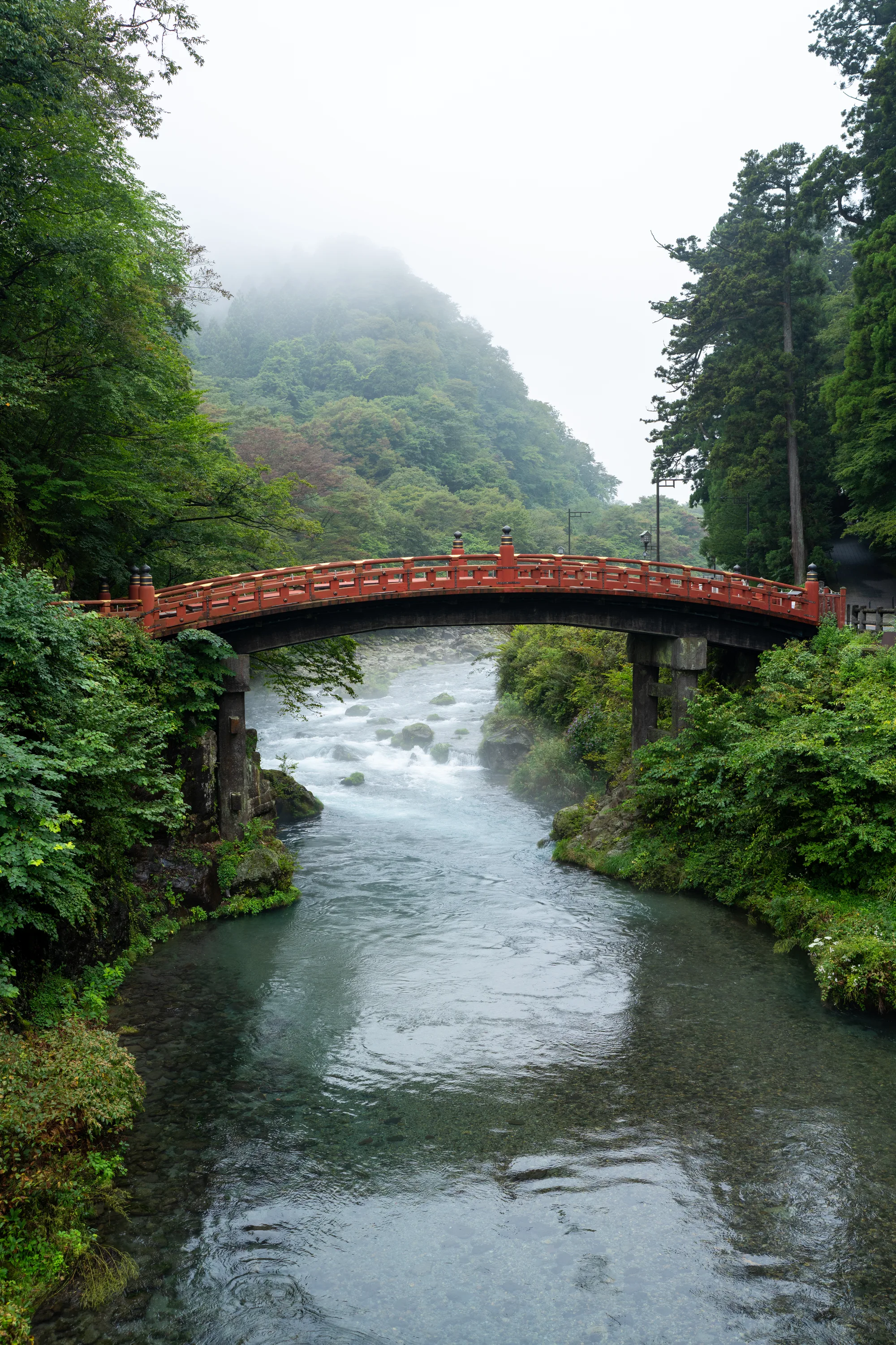 shinkyo bridge across the daiya river in nikko japan on a misty day
