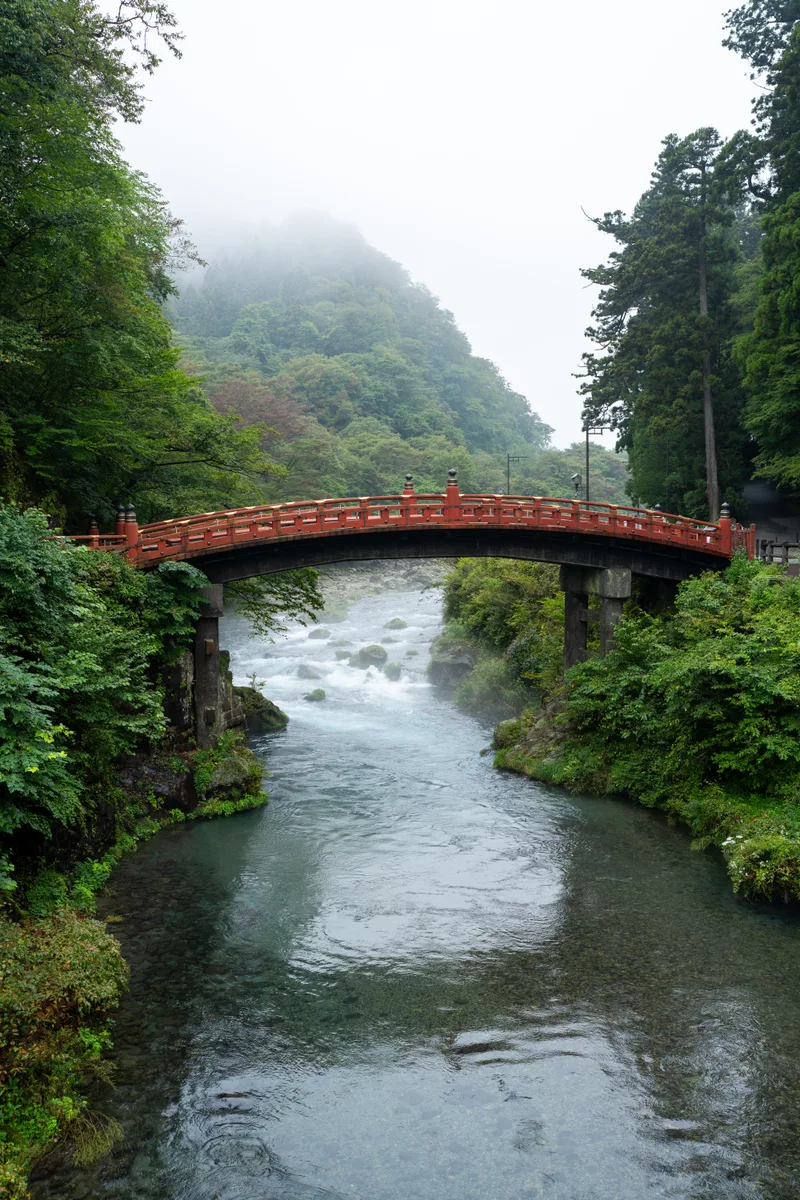 shinkyo bridge across the daiya river in nikko japan on a misty day
