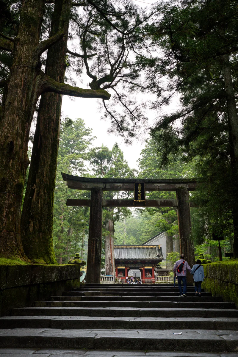 stone tori gate at the entrance to Nikko Toshogu